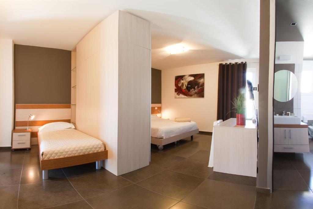Ragusa Inn Cameră foto